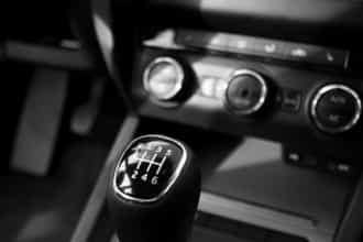 Black and white picture of car gear stick and gears. This photo was taken in Woodland Hills, California.  
